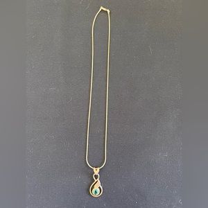 Sterling silver necklace with blue crystal